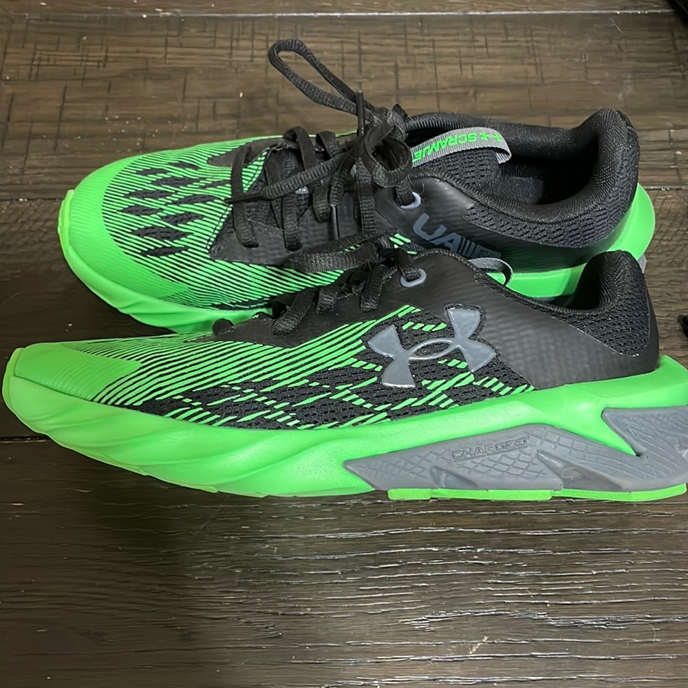 Two pair of Under Armor Youth size 7 sneakers